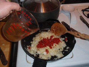 Adding Wine to Onions, Garlic and Tomatoes