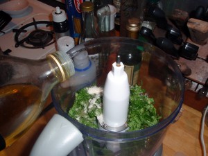 Adding Olive Oil to the Sugar and Mint in the Food Processor