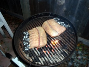 Lamb Racks Positioned on the Grill