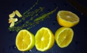 Lemon, Garlic Cloves and Thyme Sprigs