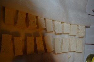 Dry tofu on paper towel